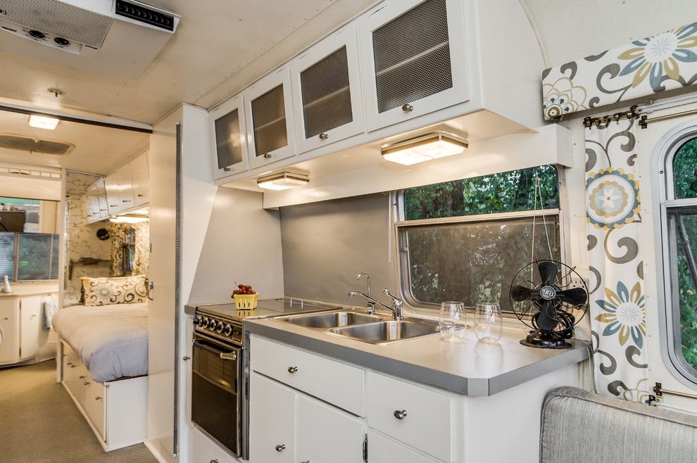 Airstream Renovation for a Midcentury Kitchen with a Glamping and '72 Avion Camper Renovation by William Johnson Architect