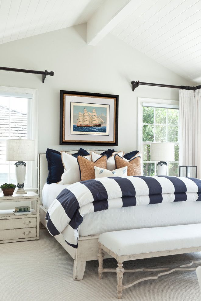 Duvet Definition for a Beach Style Bedroom with a Cathedral Ceiling and Traditional Beach | Ocean Boulevard by Barclay Butera Interiors