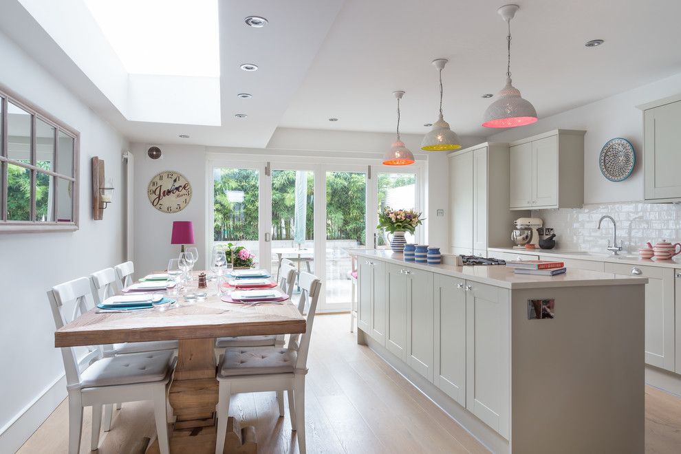 M&m Lighting for a Transitional Kitchen with a Sliding Glass Doors and London Town House by Town House Interiors