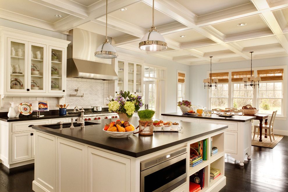 Quartz vs Granite Countertops for a Traditional Kitchen with a Backsplash and Expansive Kitchen by Garrison Hullinger Interior Design Inc.