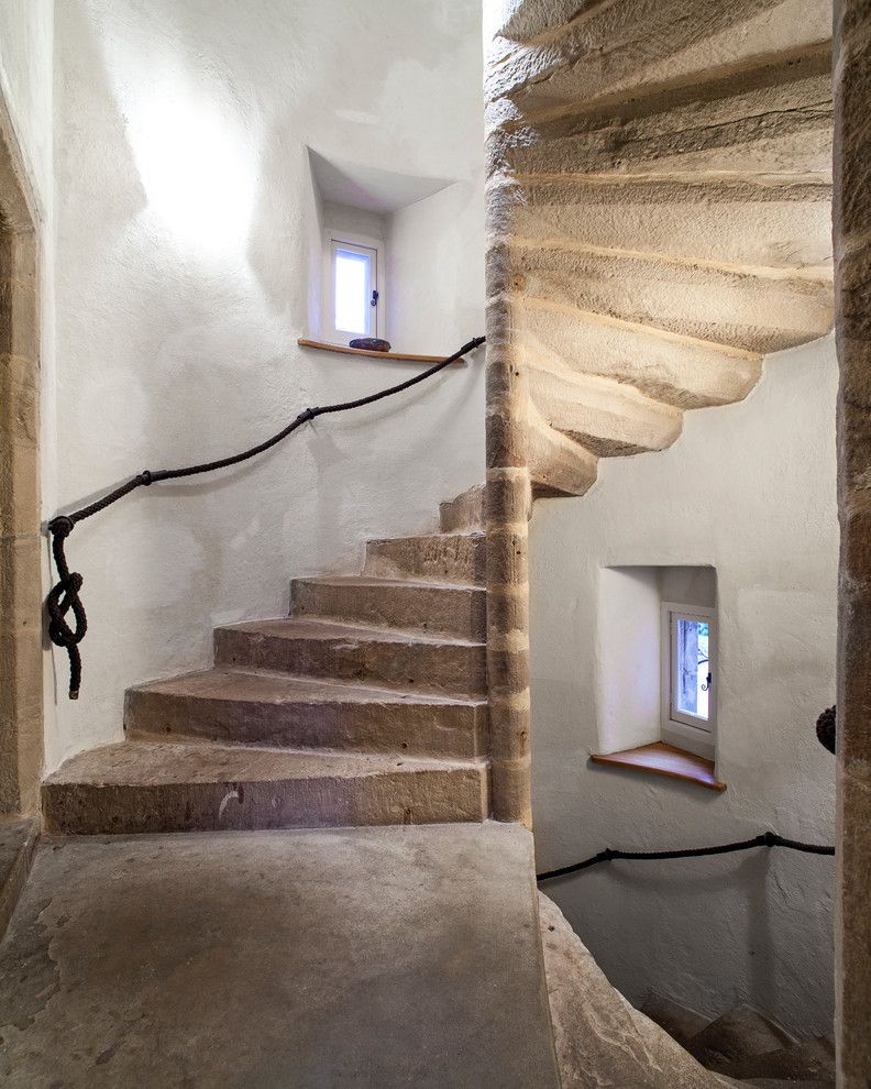Castle Metals for a Rustic Staircase with a Castle and Dalcross Castle by Maxwell & Company Architects