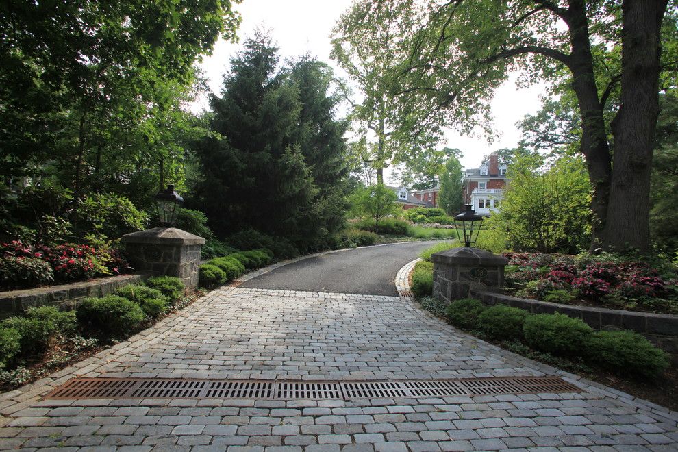 How to Lay Pavers for a Traditional Landscape with a Shade Garden and Cobblestone Entry with Stone Piers and Walls by the Todd Group