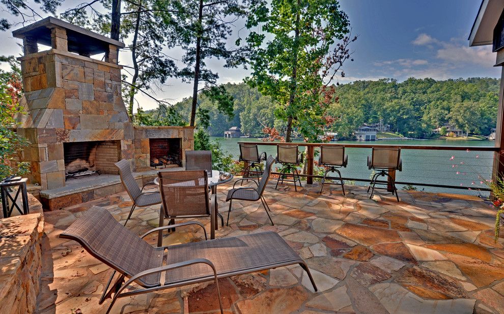 Lake Winnipesaukee Real Estate for a Rustic Patio with a Envision Virtual Tours and Lake Burton Custom Homes by Envision Web