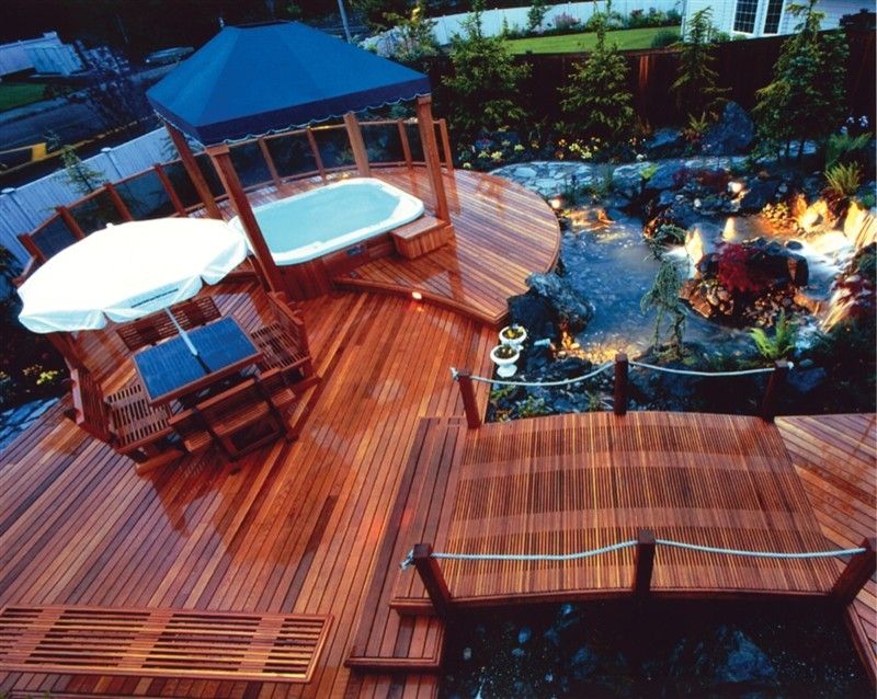 Mono Hot Springs for a Traditional Landscape with a Backyard Water Design and Hot Spring Deck Design by Hot Spring Spas